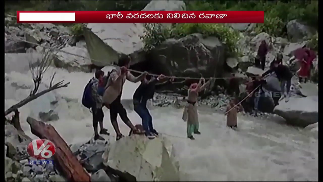 Uttarakhand Roads Blocked Due To Heavy Rains, Villagers Force To Cross River With Ropes |